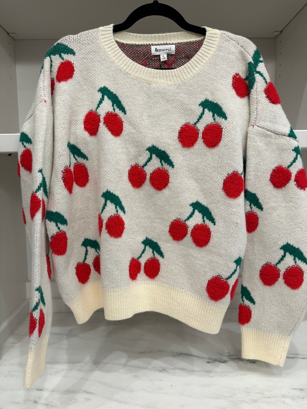 &Merci small white sweater with cherry designs.  Like new